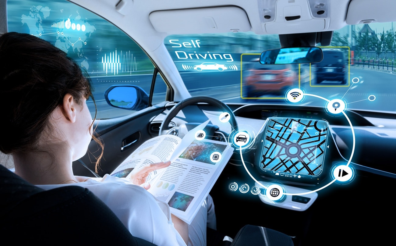 Woman reading in a self driving car
