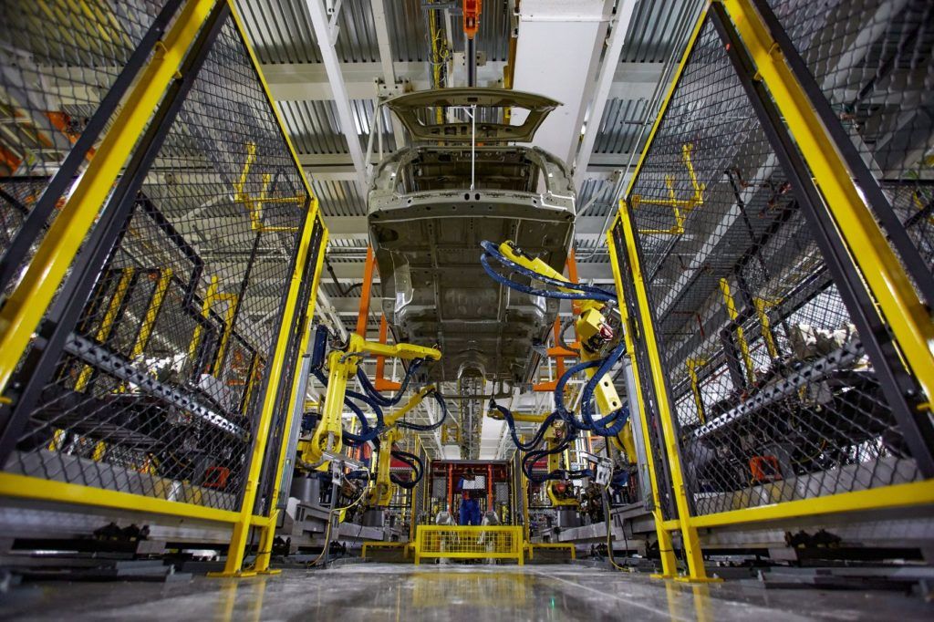 Underbody sealant for the 2021 Chevy Tahoe and Suburban is applied robotically at GM’s Arlington Assembly plant in Arlington, Texas.